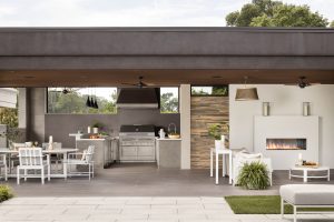 Outdoor Living Space: Outdoor kitchen, dining room and fireplace with lounging area.